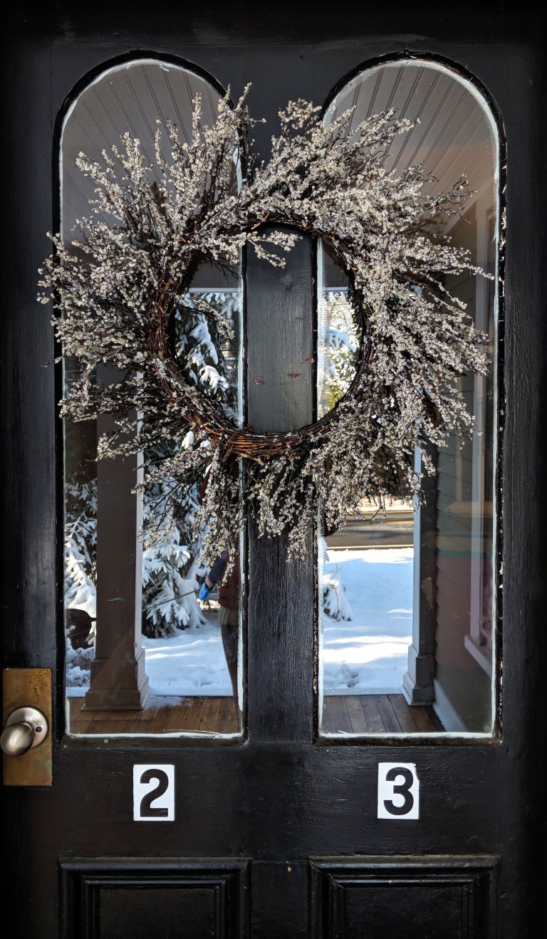 Door with holiday wreath