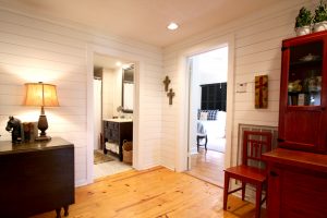 Airbnb photos of bedroom and bathroom hallways
